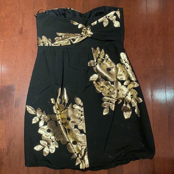Black with gold strapless cocktail dress, gold shimmer through black under light - Picture 2 of 3